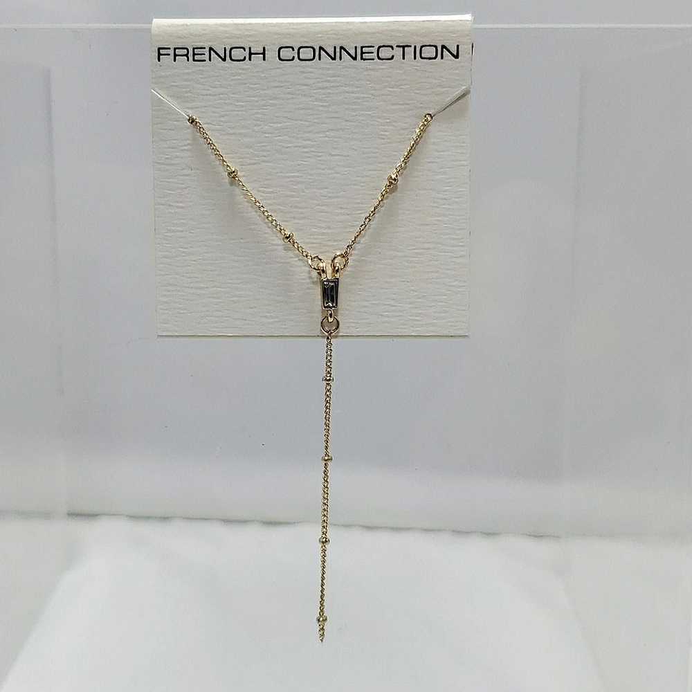 French connection gold charm necklace